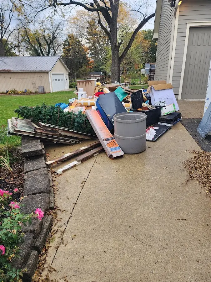 Dumpster being loaded with debris for 3 Yard Dumpster Rental in San Buenaventura (Ventura)